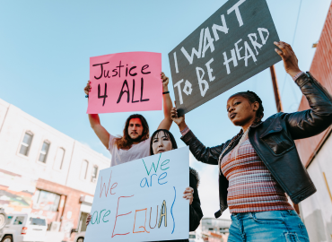 protesters with social justice signs